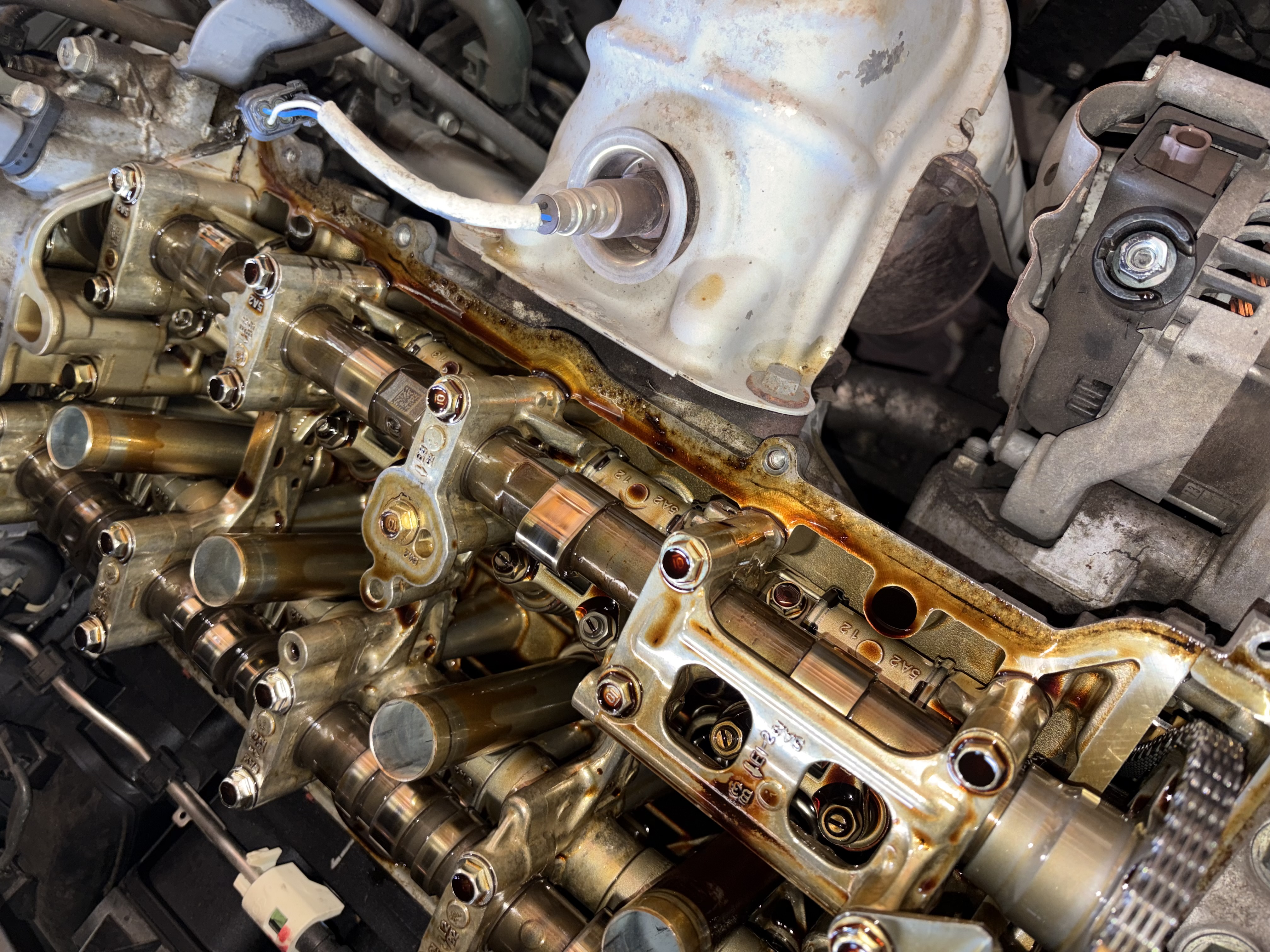 Close-up of an engine cylinder head during service at Garage Worx Auto